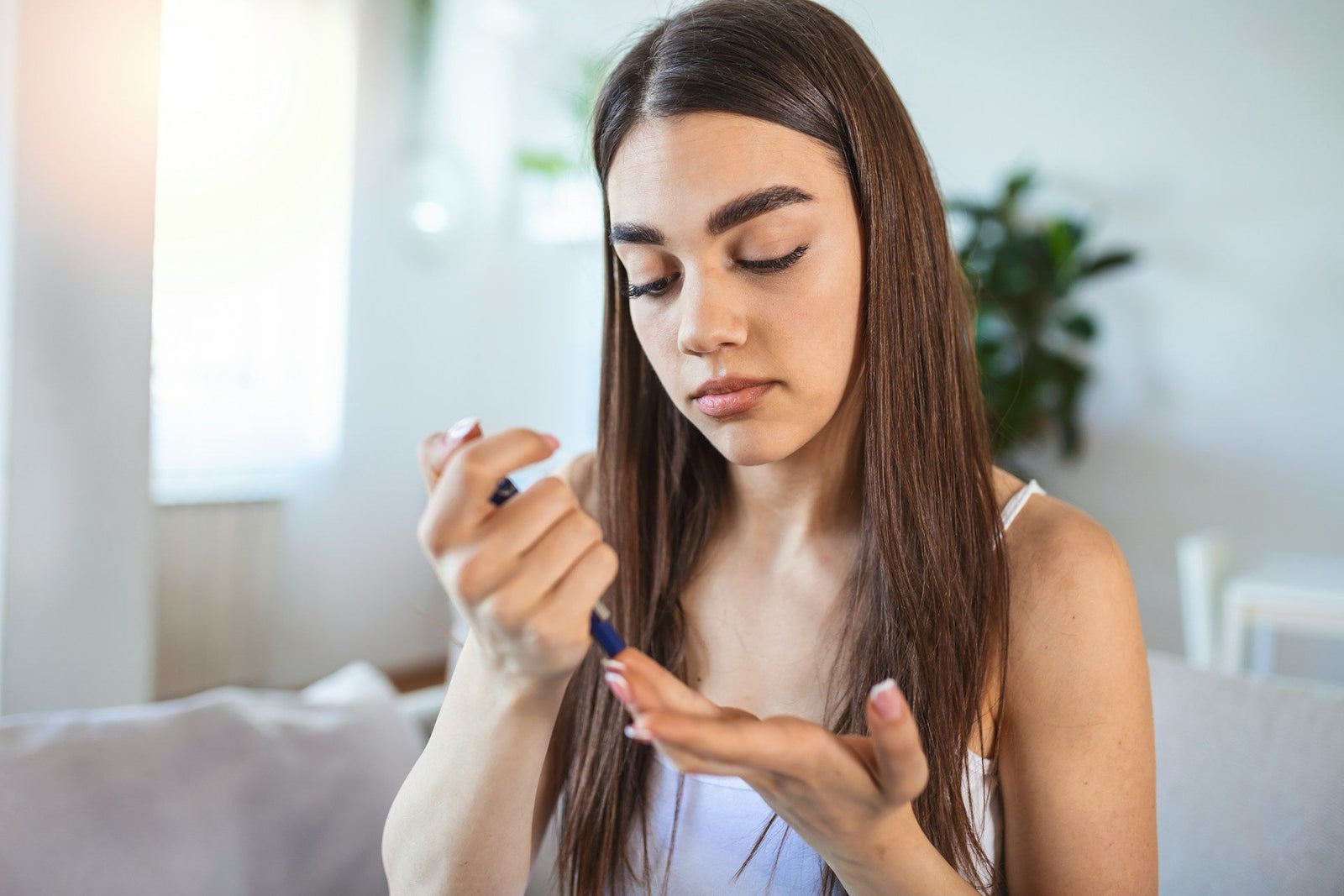 woman checking blood sugar