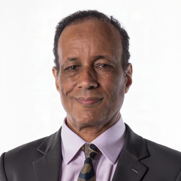Man wearing a suit and tie on a white background
