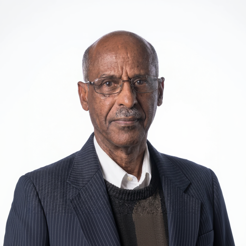 Man wearing glasses and a suit on a white background